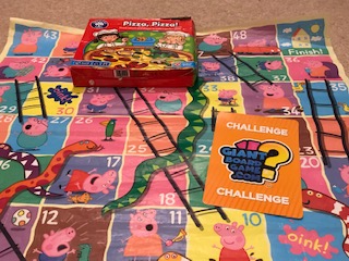 Snakes and ladders board